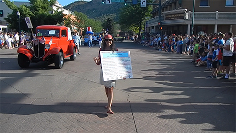 Allison walking in July 4th Durango Parade
